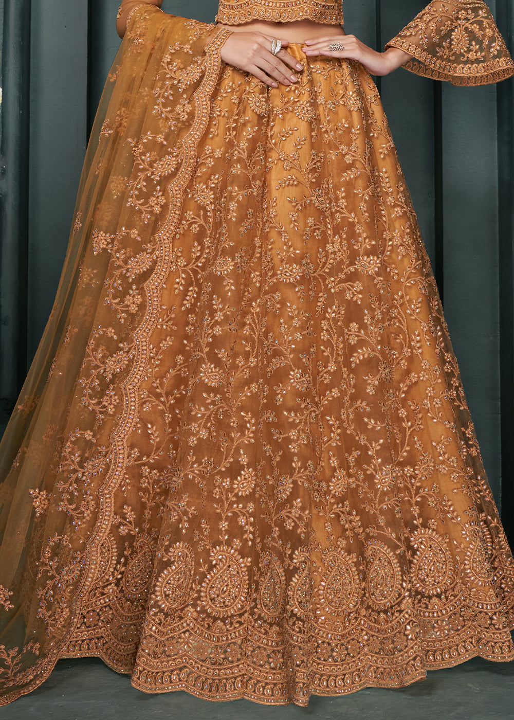 Copper Brown Net Lehenga Choli Beautifully Embroidered with Thread, Badla work & all Over Embellishments Stone work