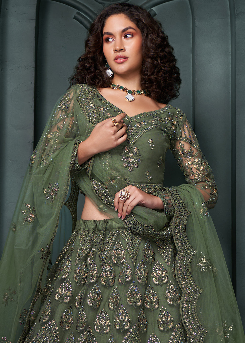 Bilbao Green Net Lehenga Choli Beautifully Embroidered with Thread, Badla work & all Over Embellishments Stone work