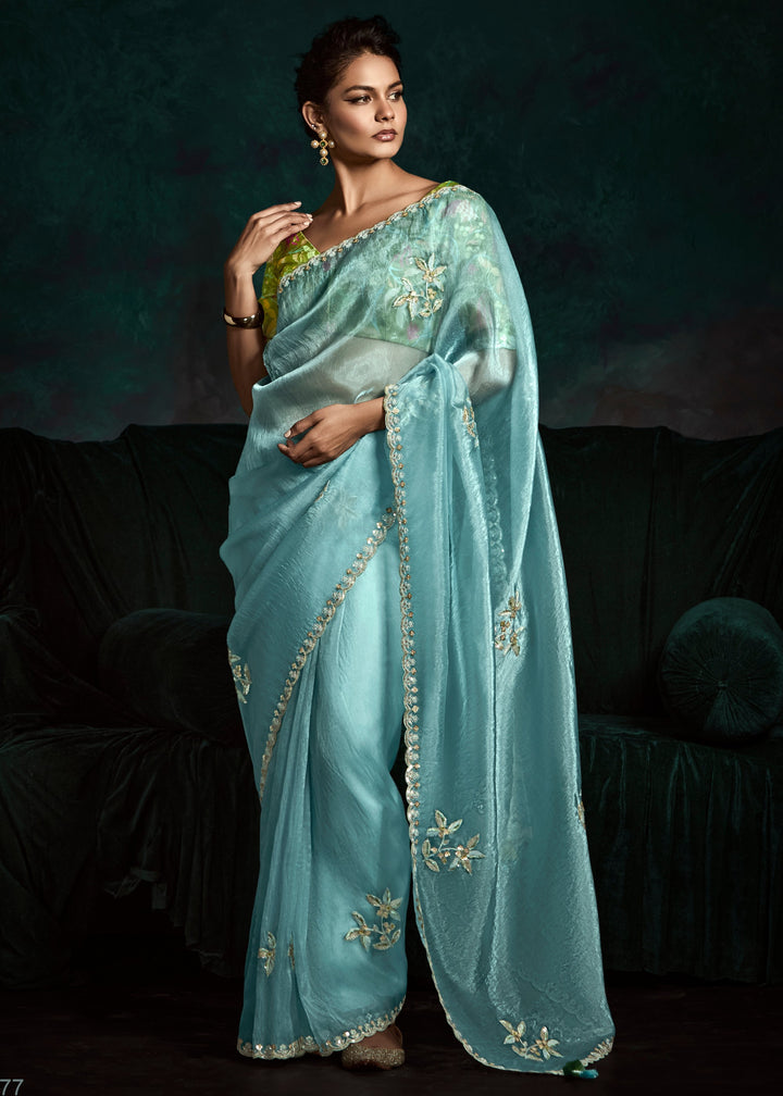 Aqua Blue Fancy Fabric Silk Saree With Sequins And Thread Embroidered Butti Work