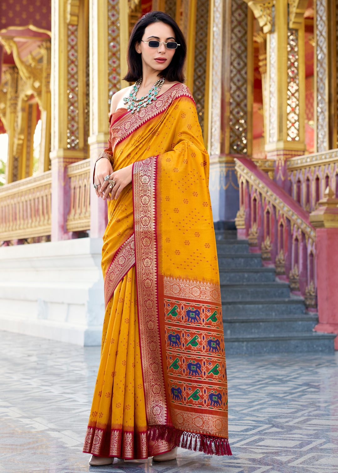 Saffron Yellow Tusser Handloom Silk Saree With Zari Weaving Border & Patola Weaved Pallu