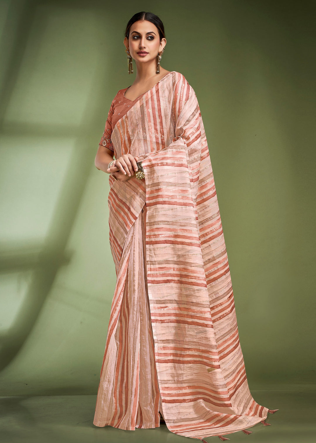 Salmon Orange Tissue Based Fancy Silk Saree With Designer Blouse