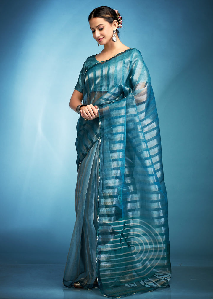 Turquoise Blue Tissue Silk Saree With Floral Print