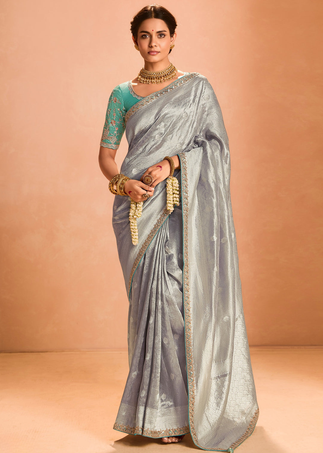 Silver Zari Tissue Silk Saree With Weaving Work And Heavy Embroidery Lace