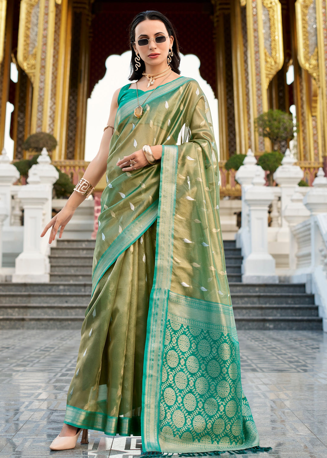 Shades of Green Tissue Silk Saree With Zari Weaving And Contrast Blouse