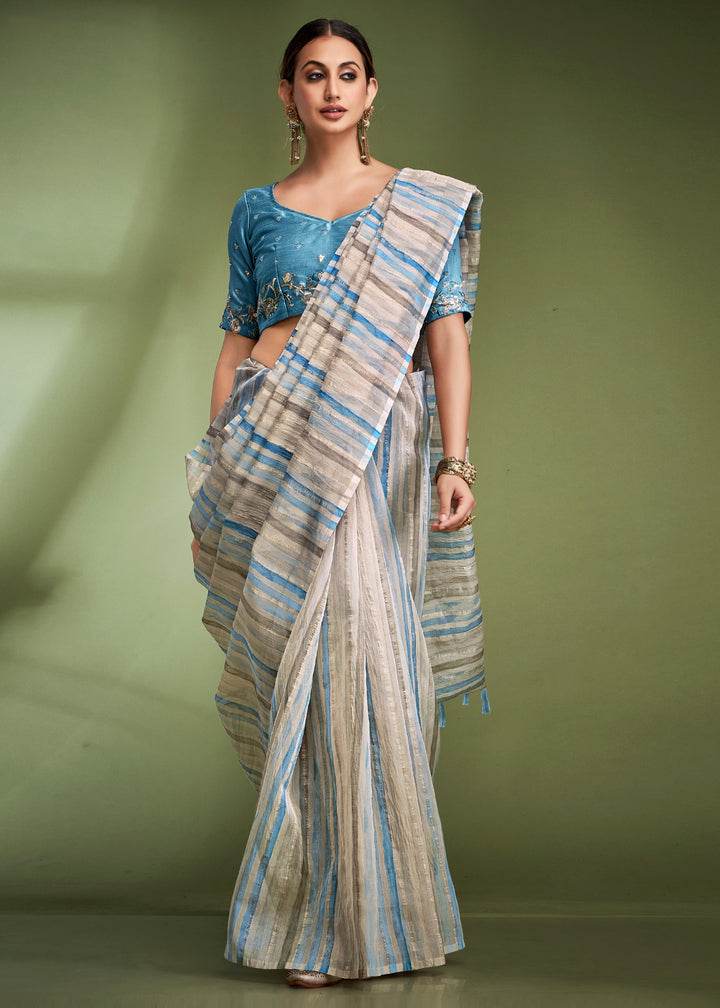 Aqua Blue Tissue Based Fancy Silk Saree With Designer Blouse