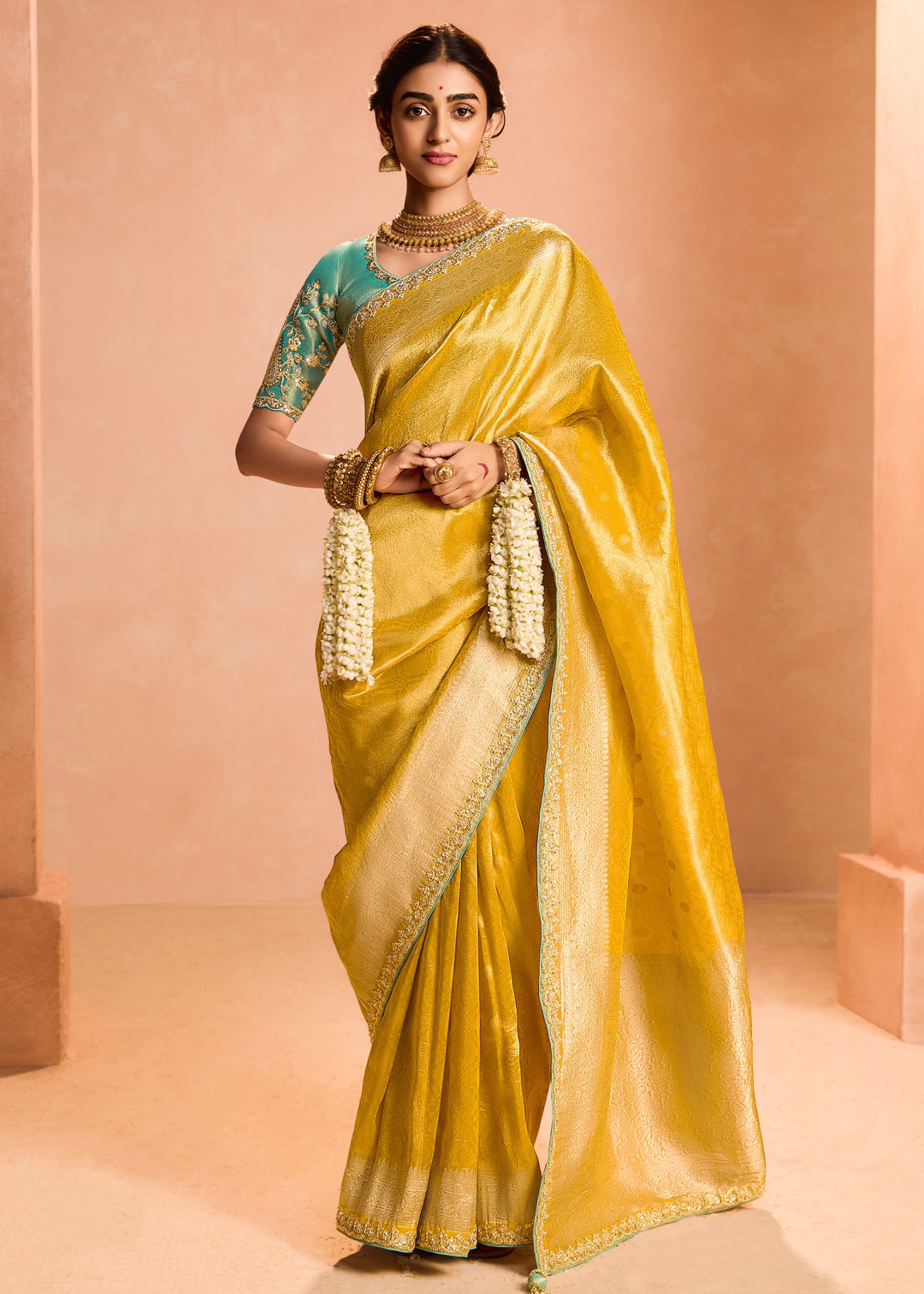 Butter Yellow Zari Tissue Silk Saree With Weaving Work And Heavy Embroidery Lace