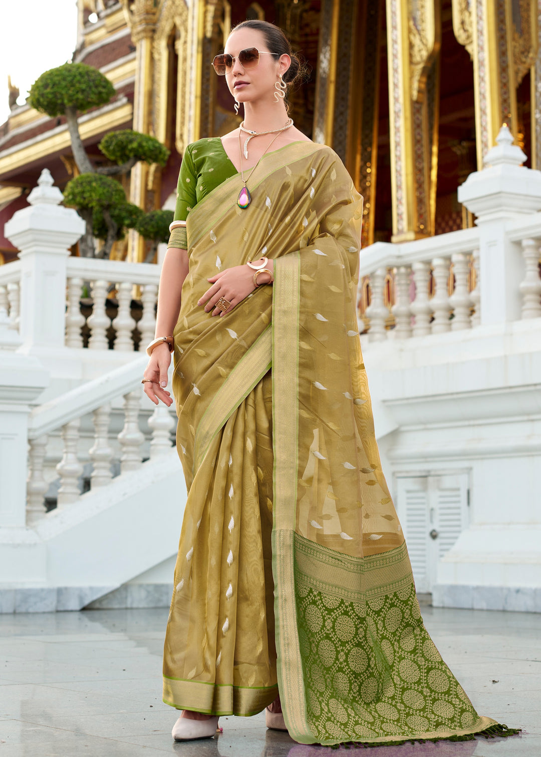 Mehendi Green Tissue Silk Saree With Zari Weaving And Contrast Blouse