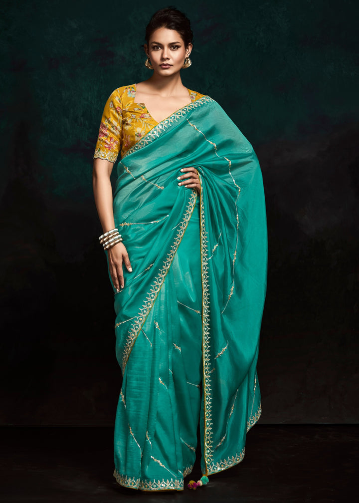 Jade Green Fancy Fabric Silk Saree With Sequins And Thread Embroidered Butti Work