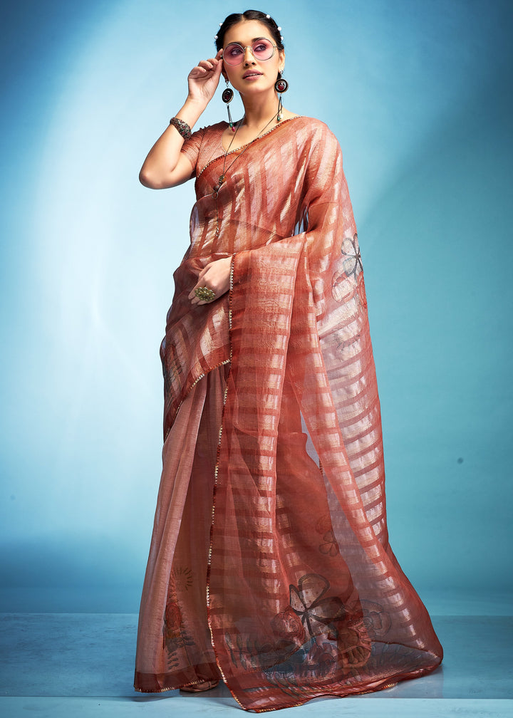 Salmon Orange Tissue Silk Saree With Floral Print