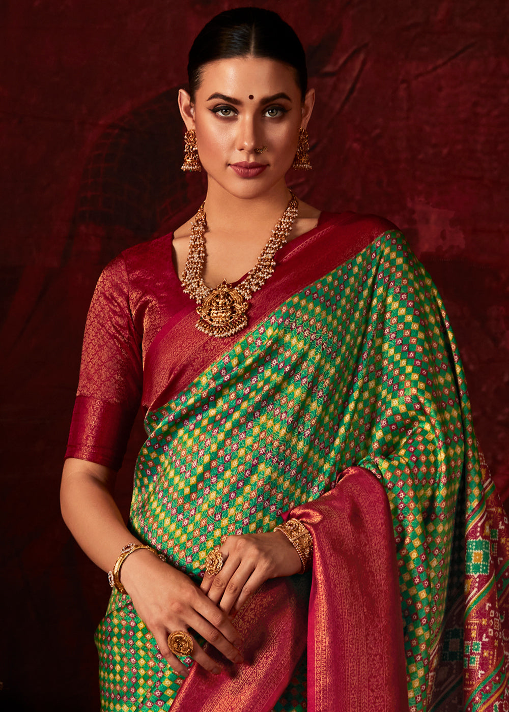 Red & Green Patola Printed Silk Saree with Contrast Blouse