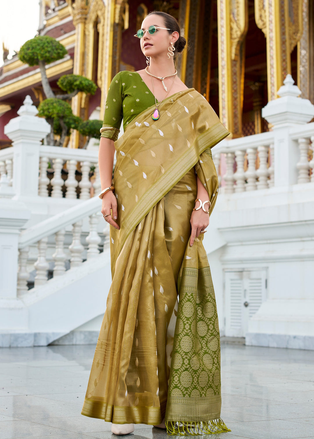 Mehendi Green Tissue Silk Saree With Zari Weaving And Contrast Blouse