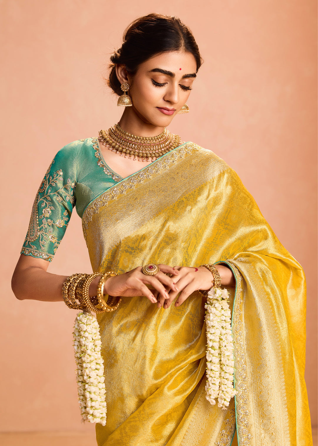 Butter Yellow Zari Tissue Silk Saree With Weaving Work And Heavy Embroidery Lace