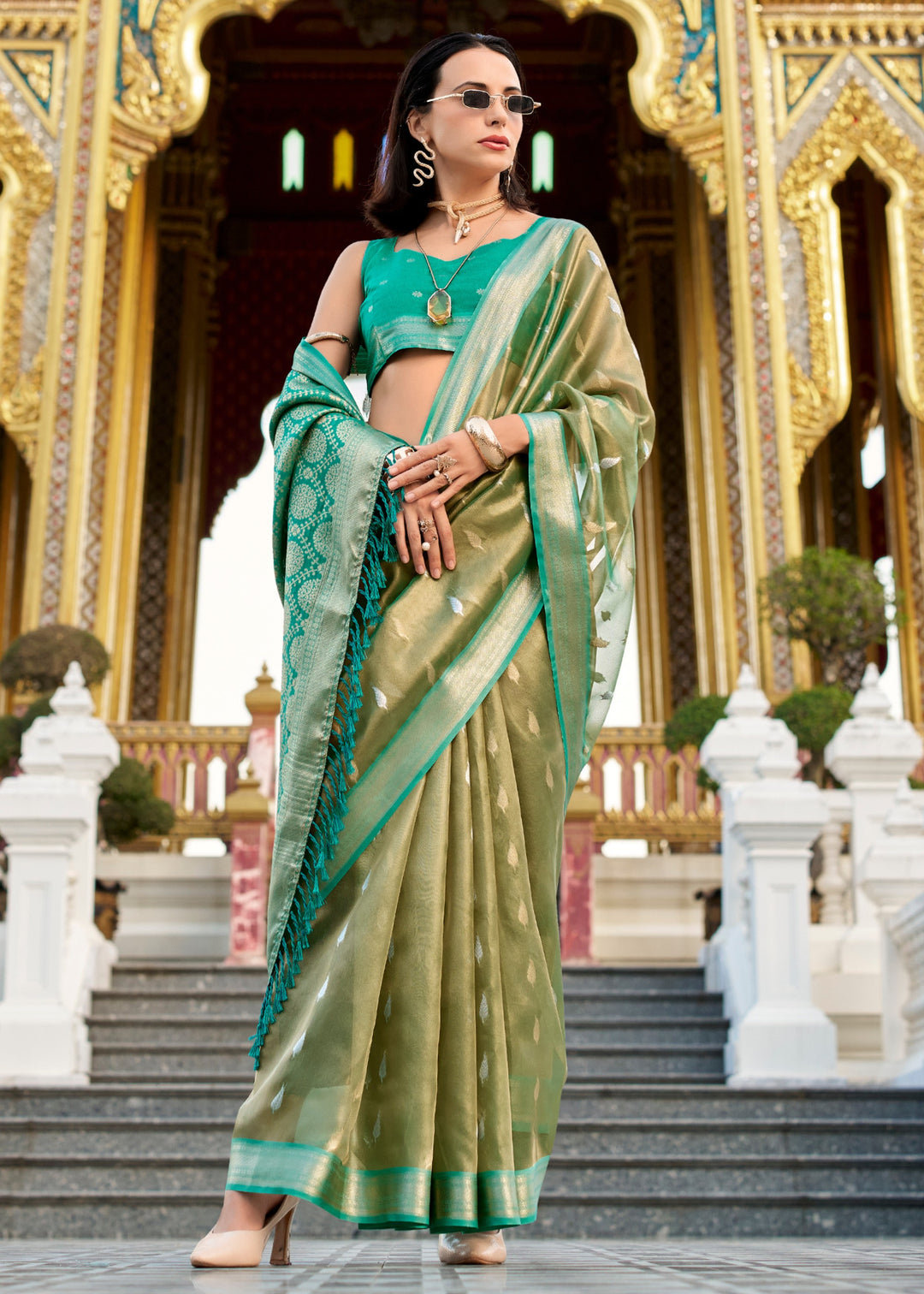 Shades of Green Tissue Silk Saree With Zari Weaving And Contrast Blouse