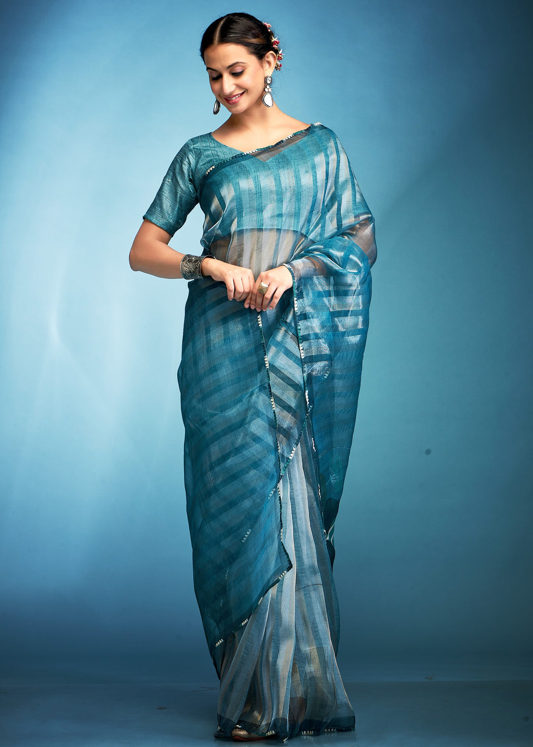 Turquoise Blue Tissue Silk Saree With Floral Print