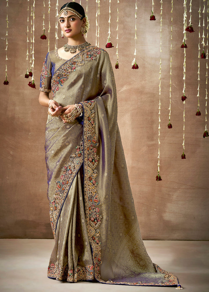 Shades Of Grey & Purple Zari Woven Tissue Dola Silk Saree having Sequence, Pearl, Mirror & Thread Work: Festival Edition