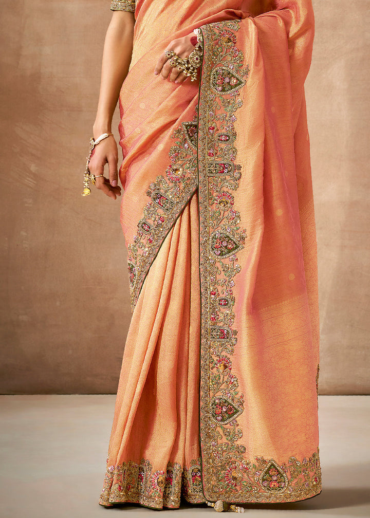 Shades Of Orange Zari Woven Tissue Dola Silk Saree having Sequence, Pearl, Mirror & Thread Work: Festival Edition