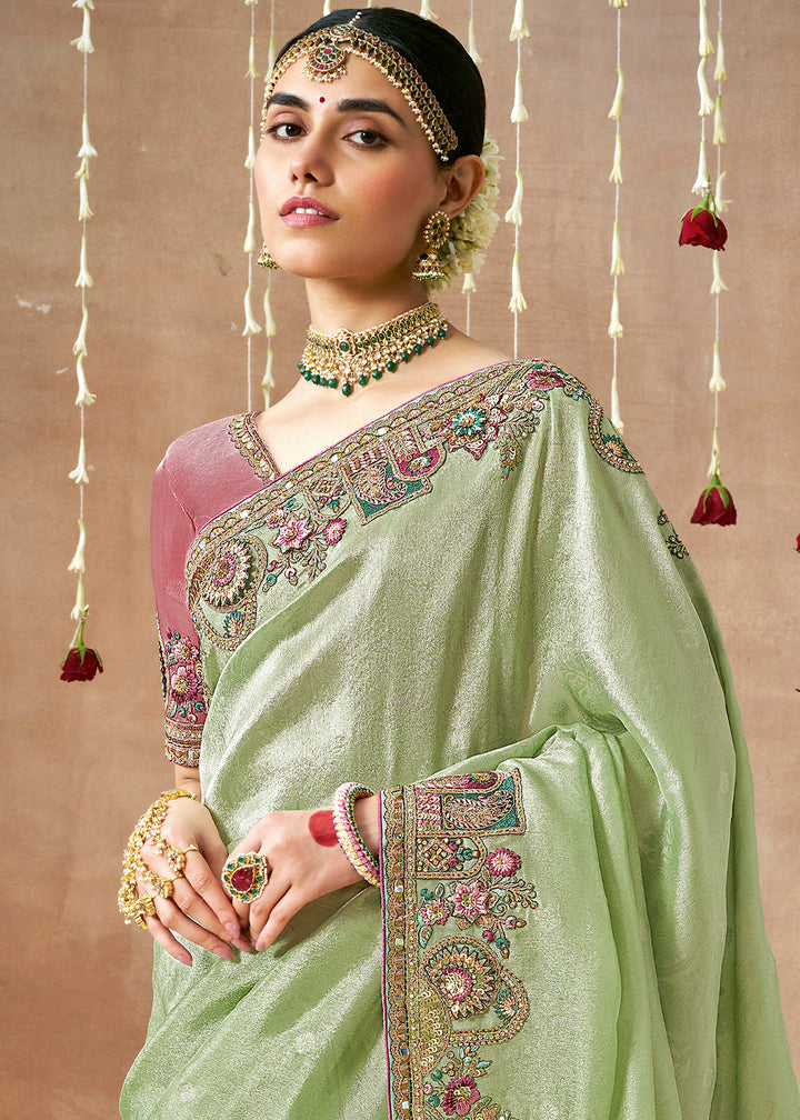 Pastel Green Zari Woven Tissue Dola Silk Saree having Sequence, Pearl, Mirror & Thread Work: Festival Edition