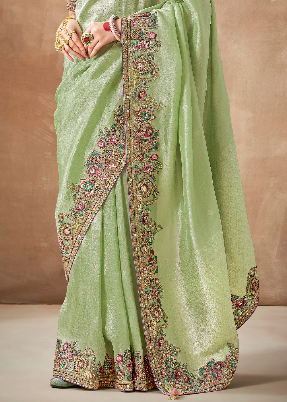 Pastel Green Zari Woven Tissue Dola Silk Saree having Sequence, Pearl, Mirror & Thread Work: Festival Edition