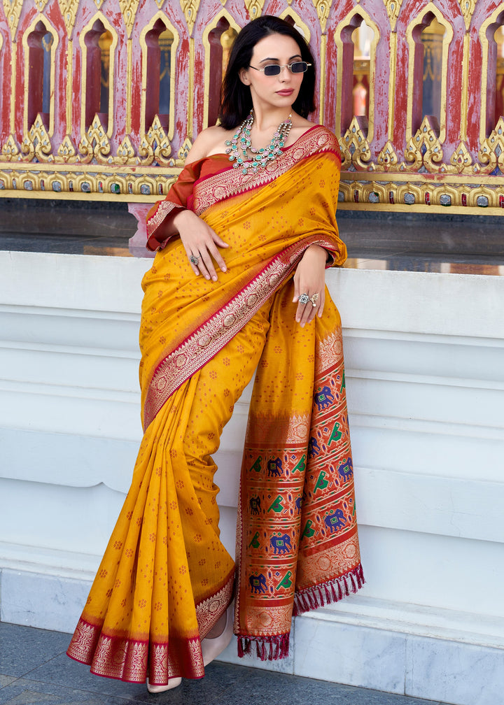 Saffron Yellow Tusser Handloom Silk Saree With Zari Weaving Border & Patola Weaved Pallu