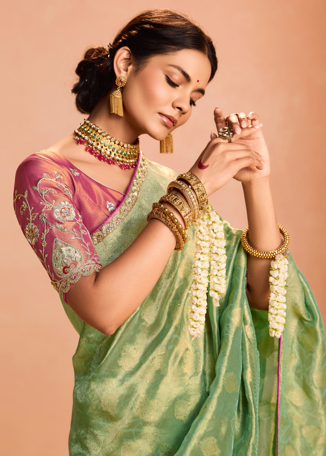 Pastel Green Zari Tissue Silk Saree With Weaving Work And Heavy Embroidery Lace