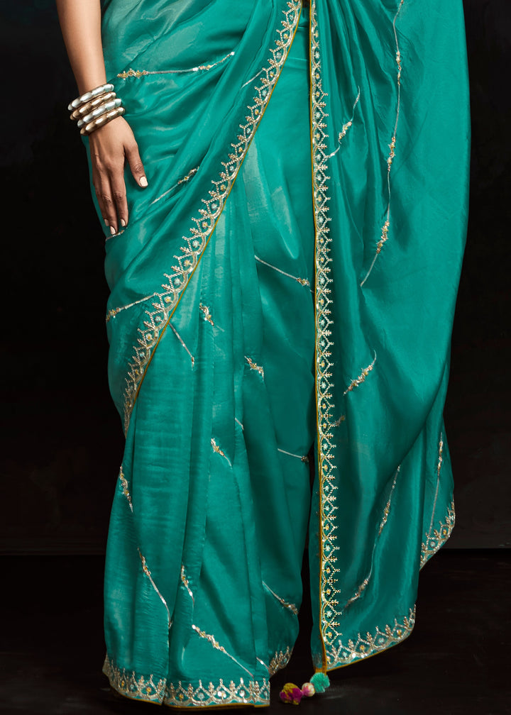 Jade Green Fancy Fabric Silk Saree With Sequins And Thread Embroidered Butti Work