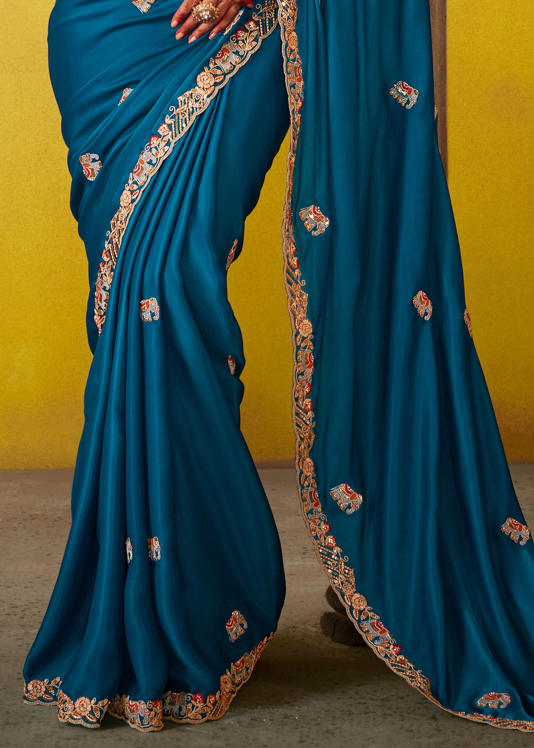 Teal Blue Glass Tissue Silk Saree With Sequins And Thread Embroidered Work