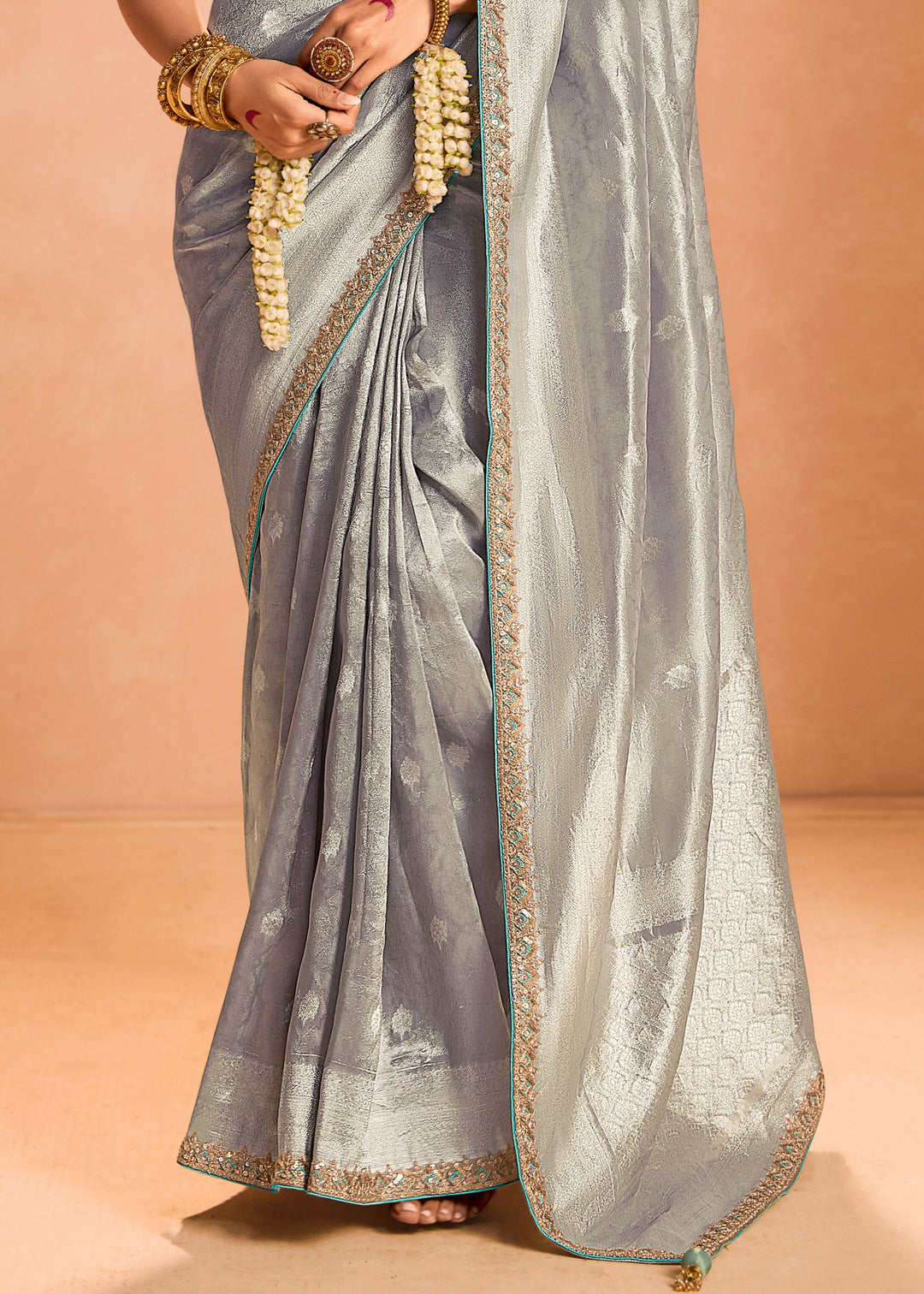 Silver Zari Tissue Silk Saree With Weaving Work And Heavy Embroidery Lace