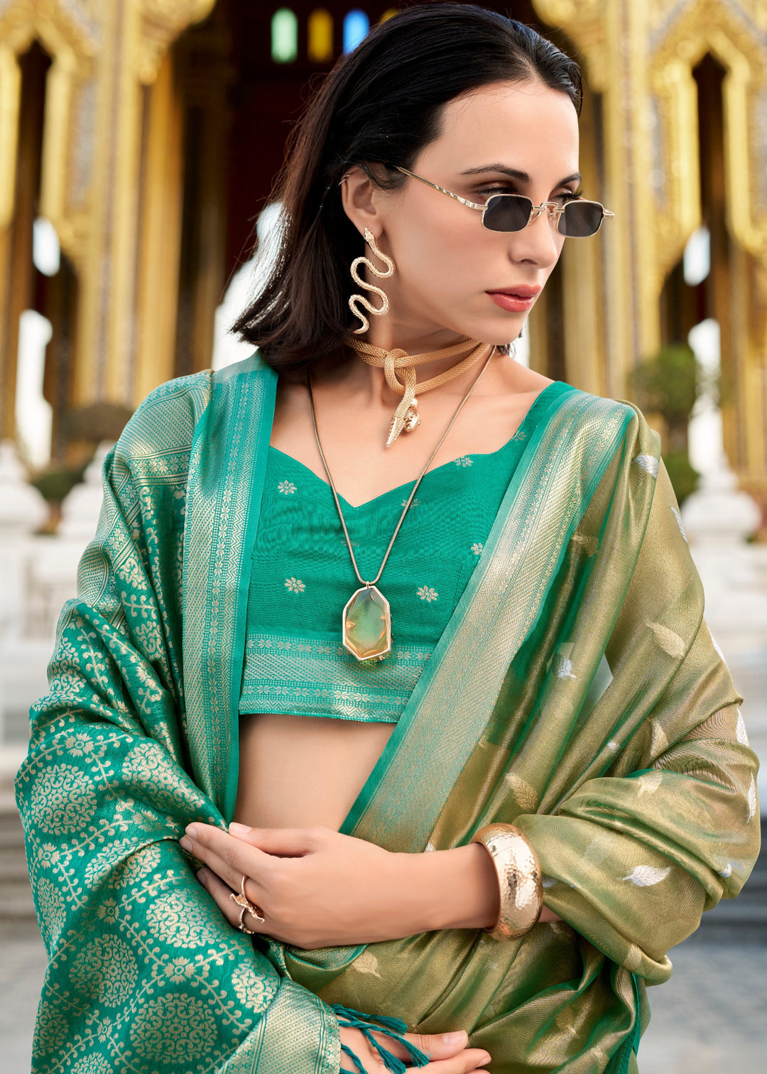 Shades of Green Tissue Silk Saree With Zari Weaving And Contrast Blouse