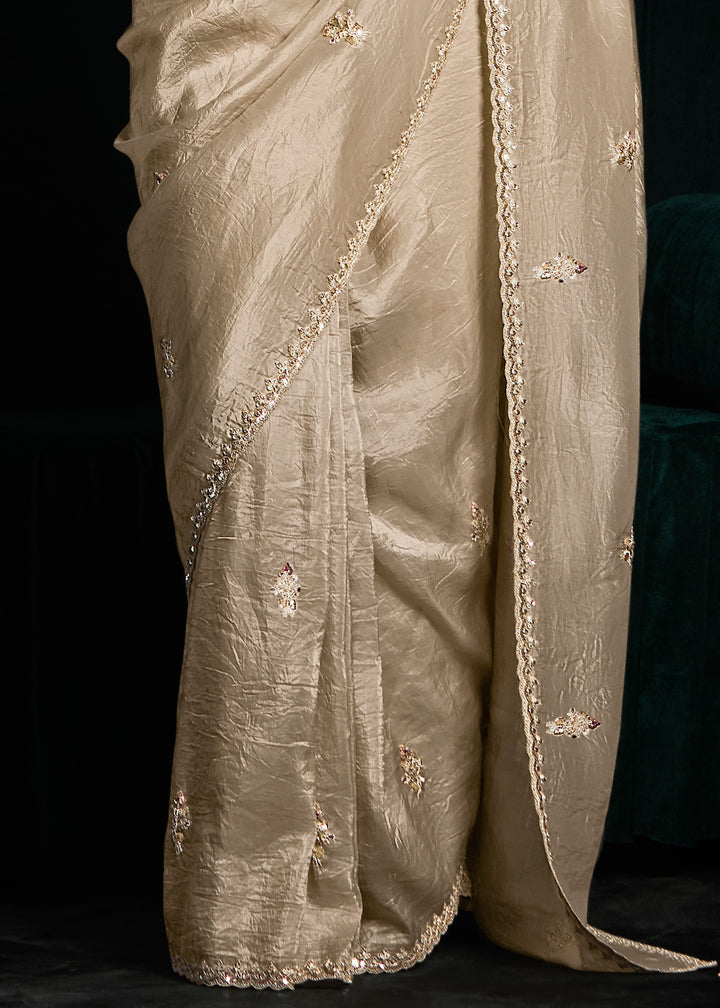 Beige Golden Fancy Fabric Silk Saree With Sequins And Thread Embroidered Butti Work