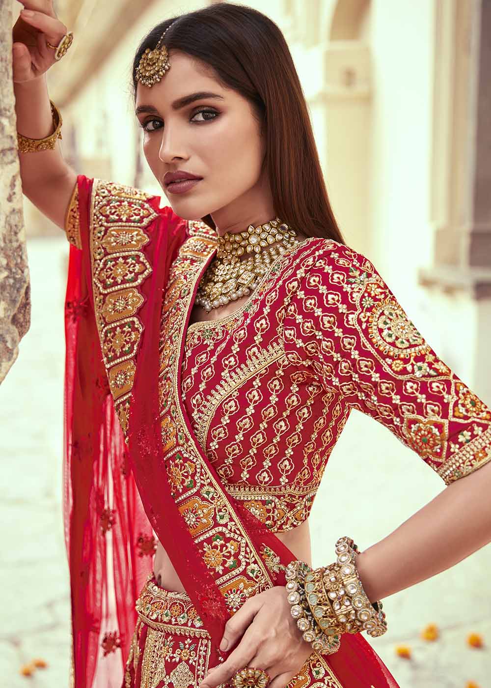 Apple Red Banarasi Silk Lehenga Choli with Jarkan, Cutdana and Hand Embroidery work:Bridal Edition