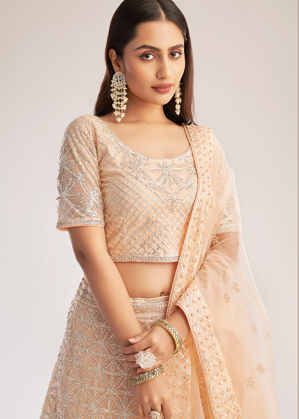 Pastel Salmon Pink Net Lehenga Choli with Gota and Zarkan work