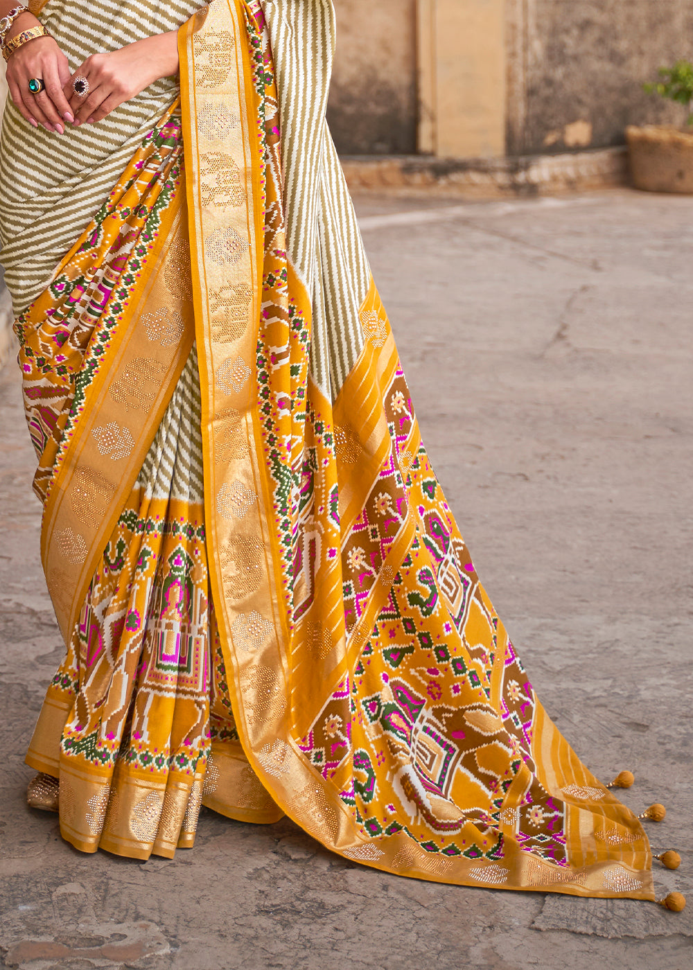 Saffron Yellow Designer Patola Silk Saree with Zari Border & Stone work(Pre-Order)