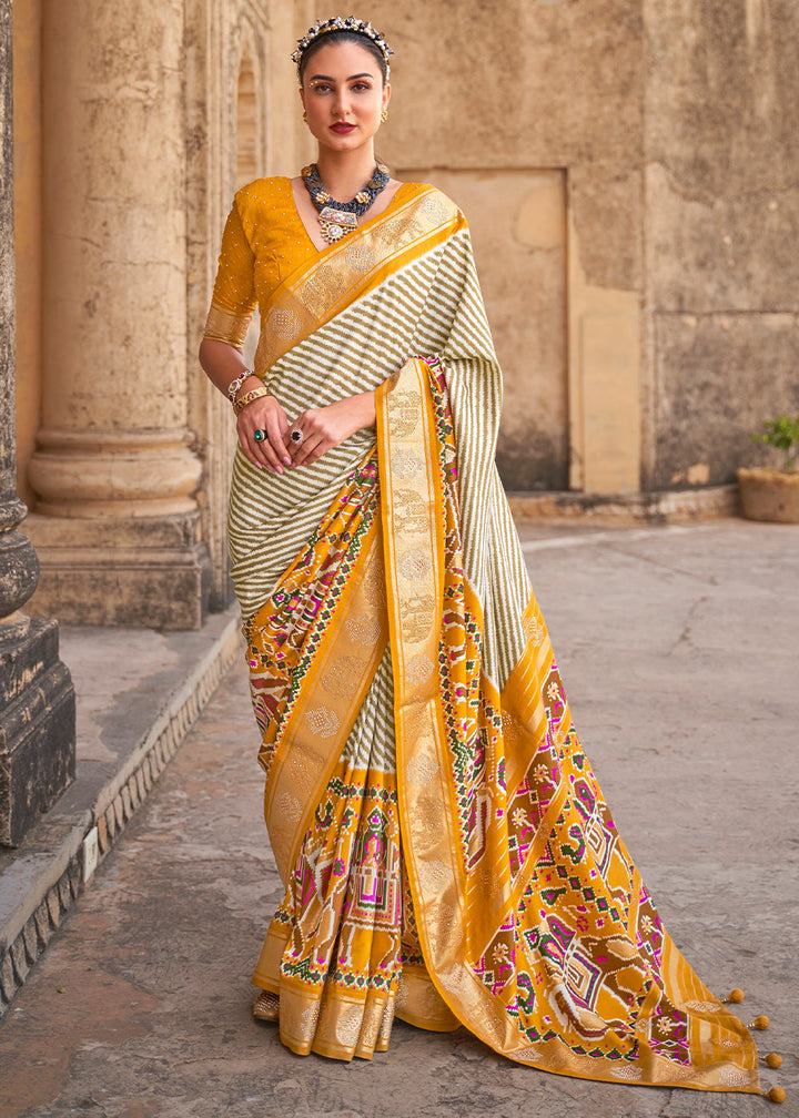 Saffron Yellow Designer Patola Silk Saree with Zari Border & Stone work(Pre-Order)