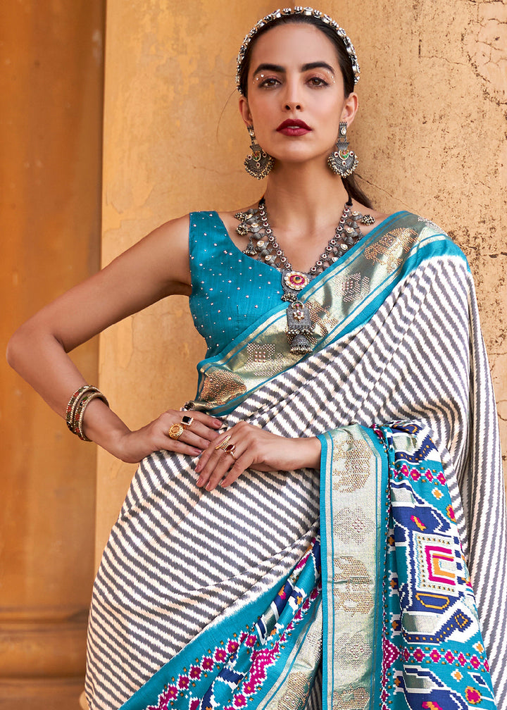 Cerulean Blue Designer Patola Silk Saree with Zari Border & Stone work(Pre-Order)