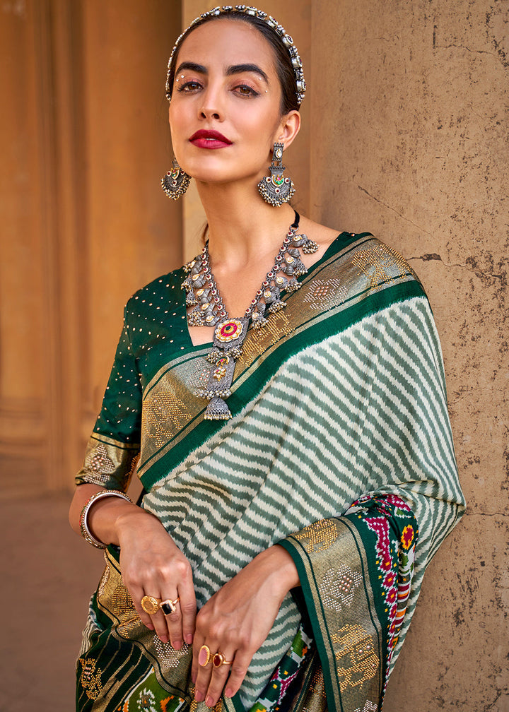 Dark Green Designer Patola Silk Saree with Zari Border & Stone work