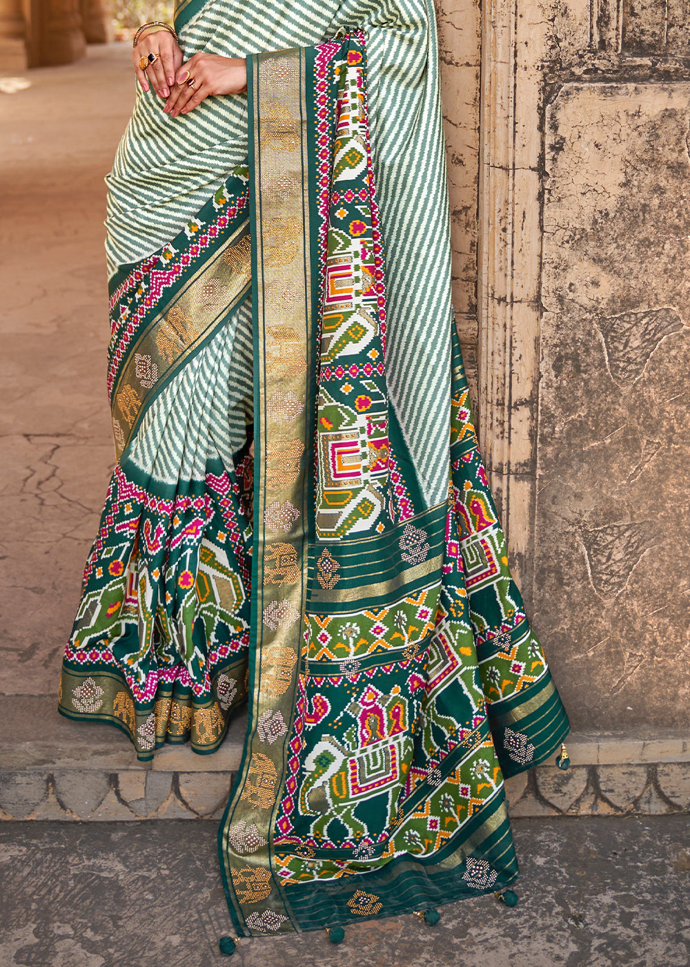 Dark Green Designer Patola Silk Saree with Zari Border & Stone work