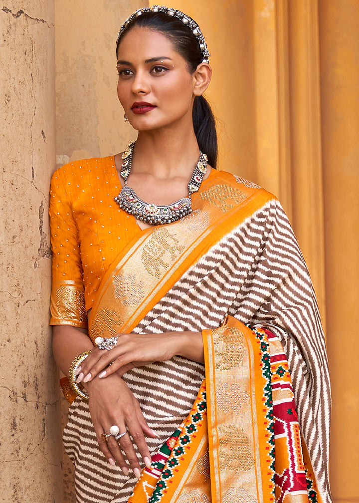 Chrome Yellow Designer Patola Silk Saree with Zari Border & Stone work