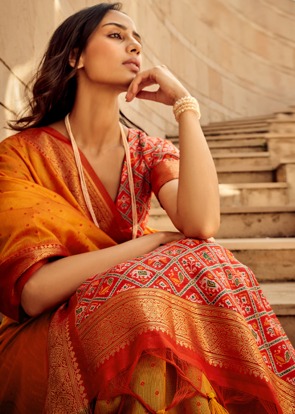 Saffron Yellow Woven Patola Silk Saree