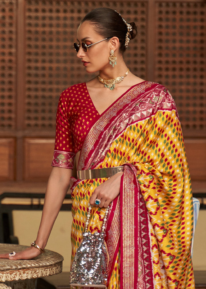 Yellow & Red Printed Patola Silk Saree with Tassels on Pallu