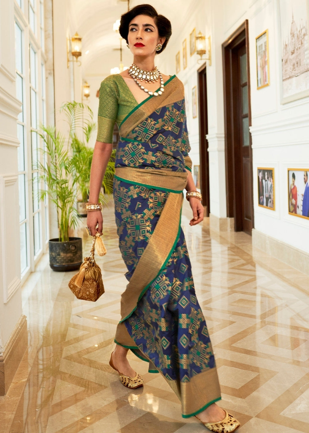 Light Blue Patola Silk Saree with Golden Border