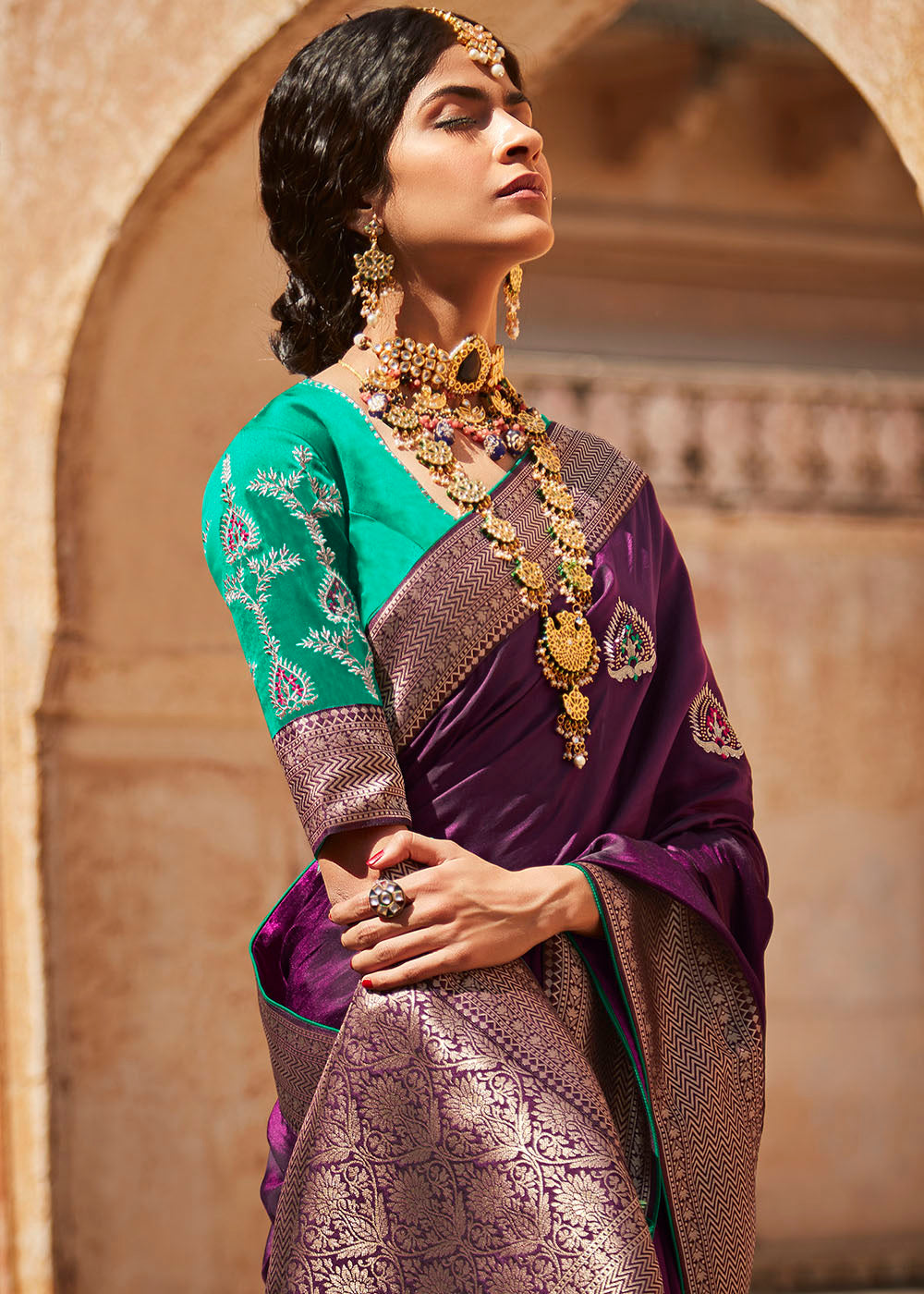 Sangria Purple Woven Silk Saree with Embroidered Blouse