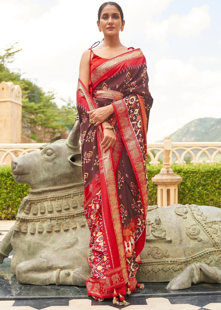 Brown & Red Patola Silk Saree with Zari Border & Tassels On Pallu