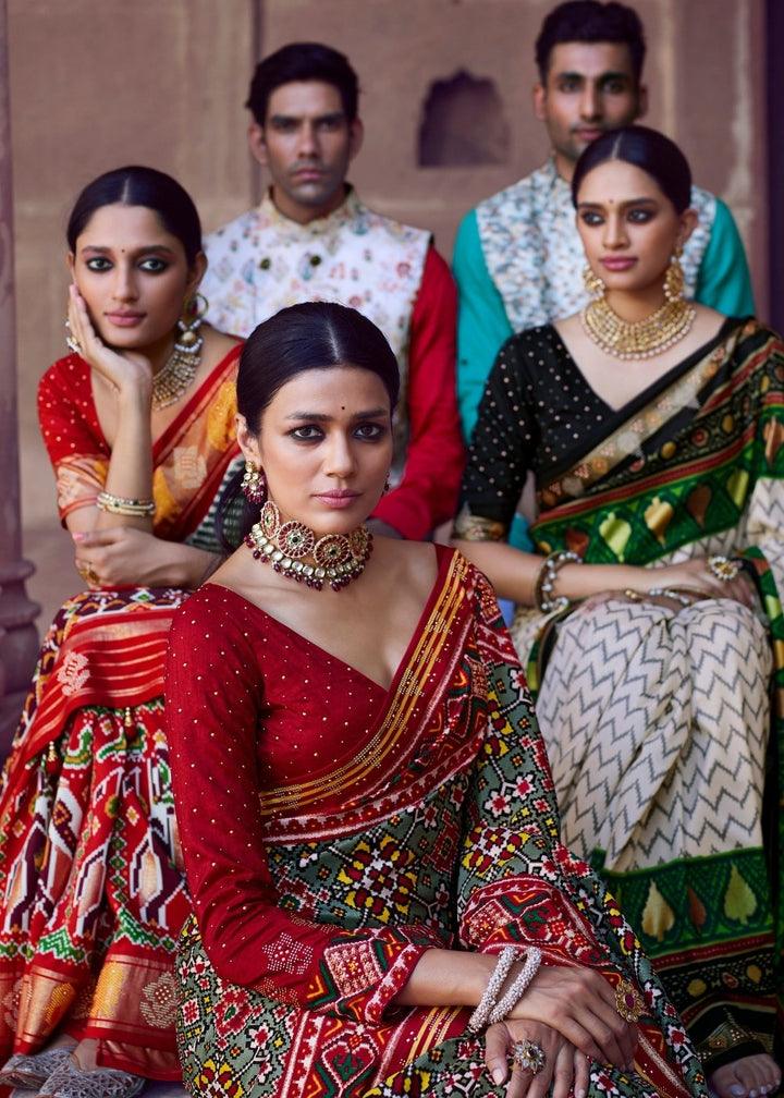 Olive Green Patola Silk Saree with Zari Border Pallu & Stone work