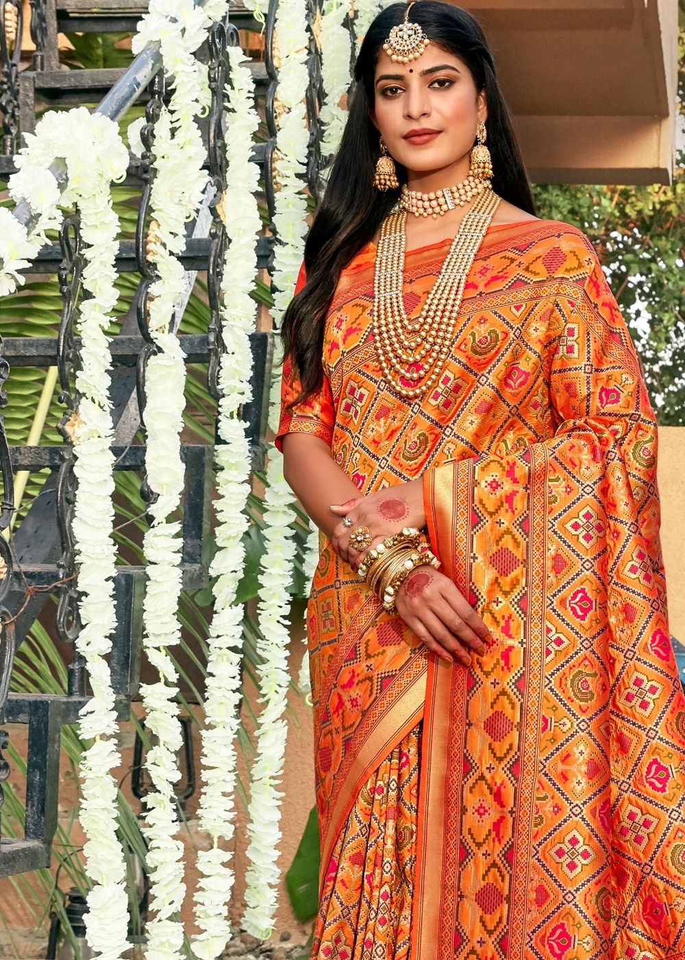 Tangerine Orange Woven Patola Silk Saree