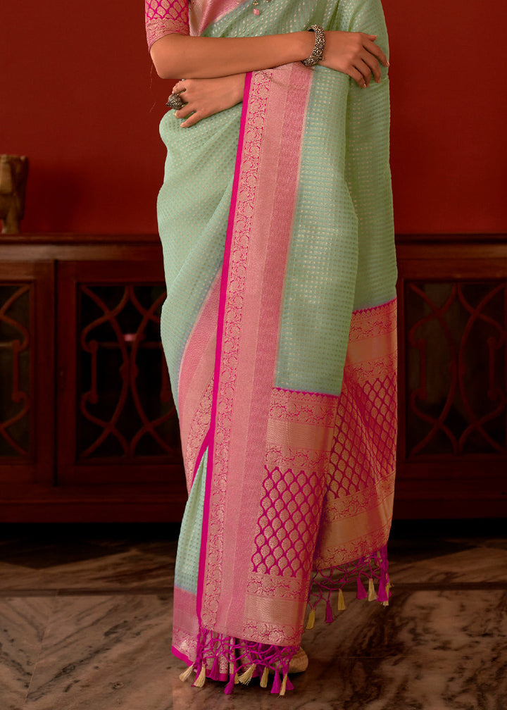 Pastel Green Zari Woven Georgette Saree with Contrast Border & Blouse