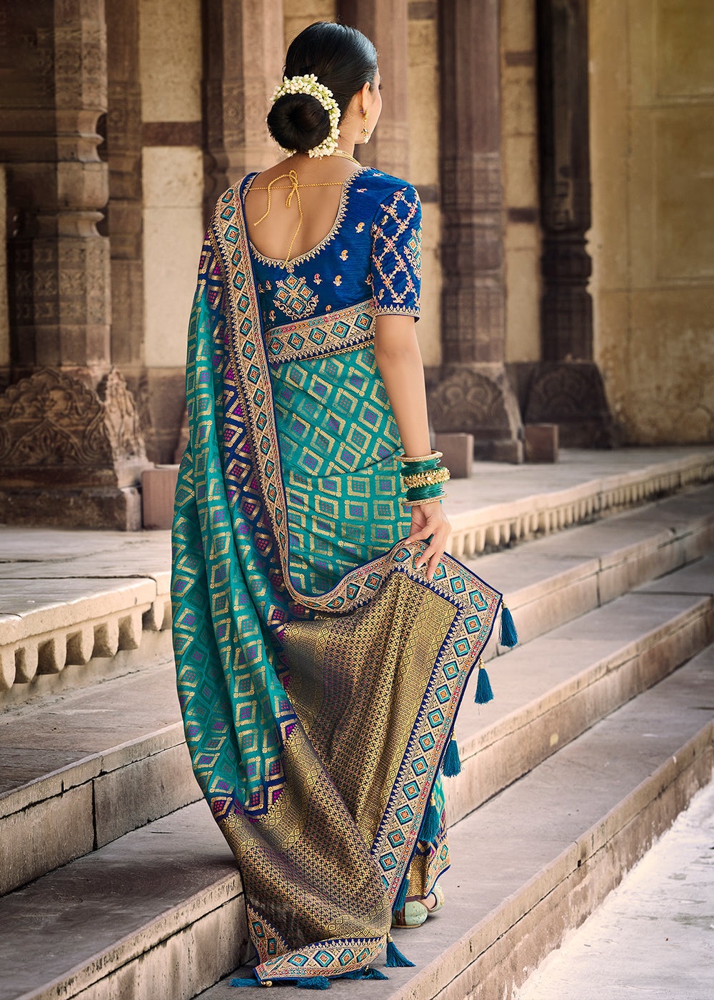 Teal Blue Woven Dola Silk Saree with Embroidered Blouse