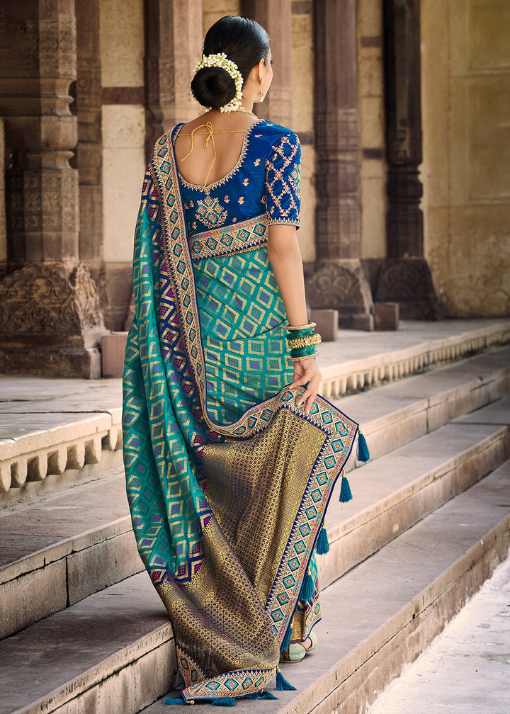 Teal Blue Woven Dola Silk Saree with Embroidered Blouse