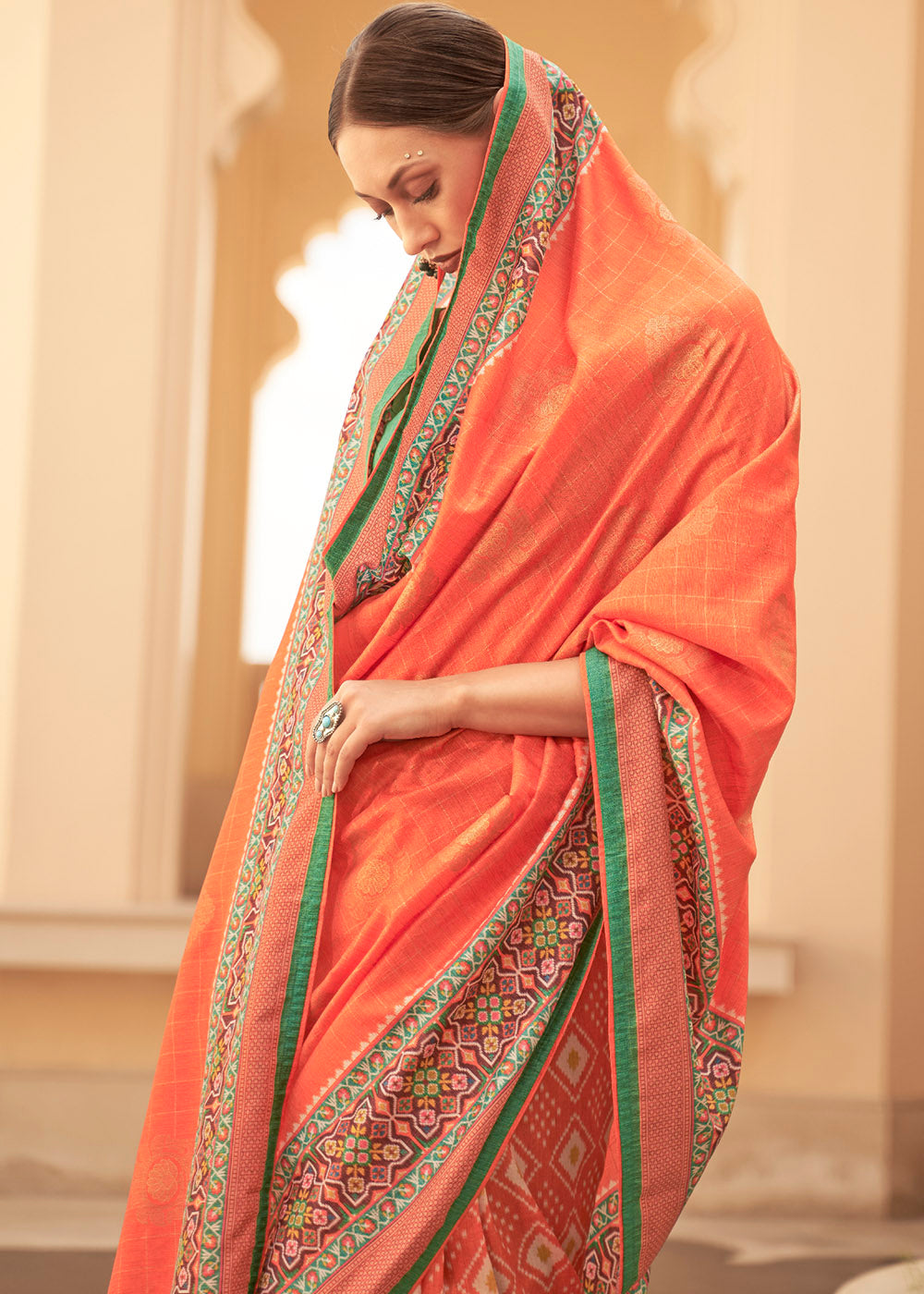 Outrageous Orange Patola Print Georgette Silk Saree