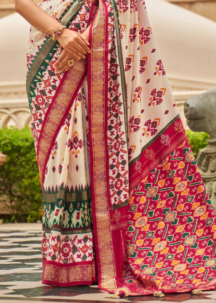 White & Red Patola Silk Saree with Zari Border & Tassels On Pallu