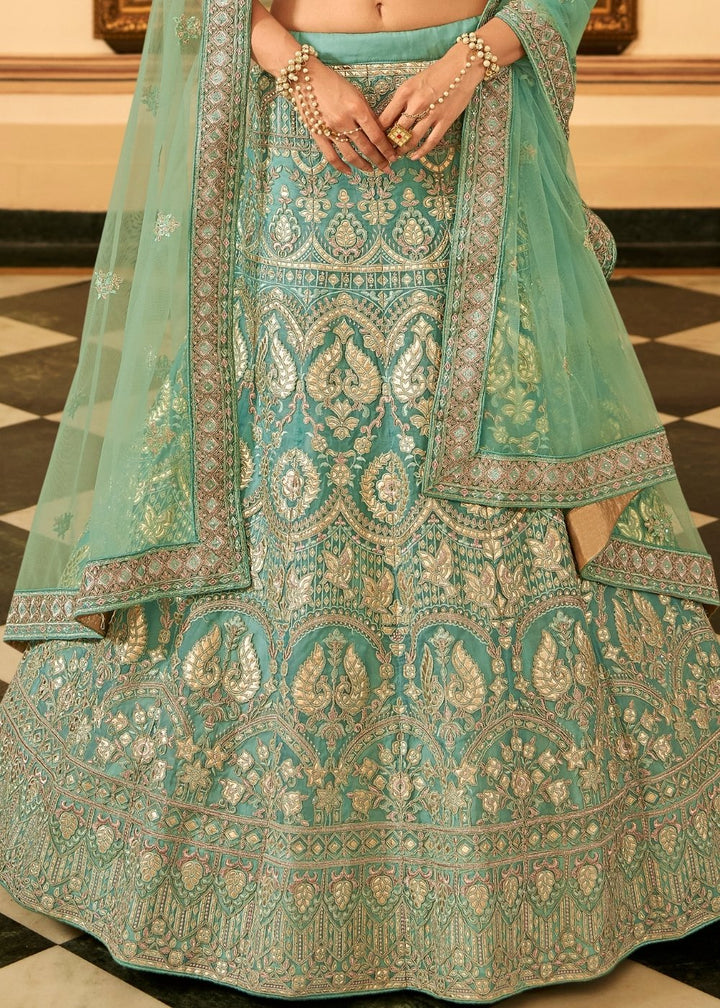 Turquoise Blue Organza Lehenga Choli with Zari, Dori, Resham, Gota & Zarkan work